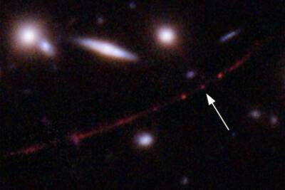 Хаббл обнаружил самую далекую звезду (Фото)