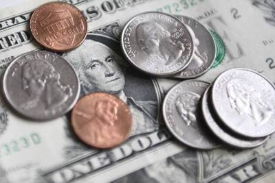 Курс доллара по итогам вторника повысился до 79,68 рублей
