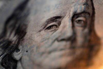 Средний курс доллара США со сроком расчетов "завтра" по итогам торгов составил 79,9731 руб.