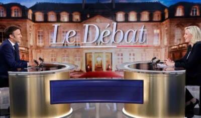 Дебаты во Франции: Эммануэль Макрон обвиняет Марин Ле Пен в "зависимости от российских властей"