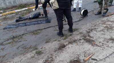 Российские оккупанты устроили под Киевом массовые расстрелы жителей: фото 18+