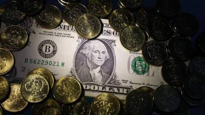 ЦБ РФ повысил курс доллара на 16,47 копейки