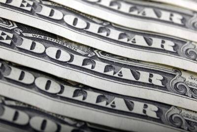 Средний курс доллара США со сроком расчетов "завтра" по итогам торгов составил 83,401 руб.