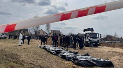 В Буче началась эксгумация тел убитых украинцев