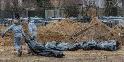В Киевской области нашли восемь массовых захоронений мирных жителей, убитых оккупантами — полиция