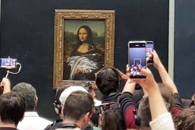 Леонардо Да-Винч - В Лувре неизвестный вымазал тортом картину "Мона Лиза" - unn.com.ua - Украина - Киев - Париж