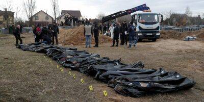 В Киевской области нашли новые массовые захоронения мирных жителей