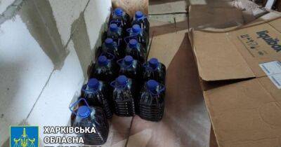 "Паленка" на 4 млн грн. На Харьковщине отец с сыном и друзьями подделывали элитный алкоголь (ФОТО)