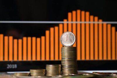 Курс рубля на Мосбирже замедлил рост до 53,21 за доллар и 55,83 за евро