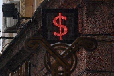 Доллар на Мосбирже символически вырос до 59,48 рубля, евро понизился до 63,3 рубля
