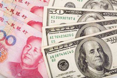 Китайский юань торговался против против доллара США почти без изменений во вторник