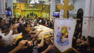 В Каире простились с 41 жертвой пожара в церкви