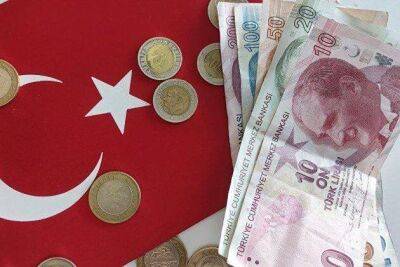 Турецкая лира дешевеет к доллару после решения Центробанка снизить ставку