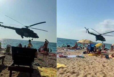 Неспокійно у Криму: Над головами туристів на пляжах літають та стріляють російські гелікоптери