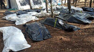 Захоронения в Изюме: эксгумировано уже более 260 тел