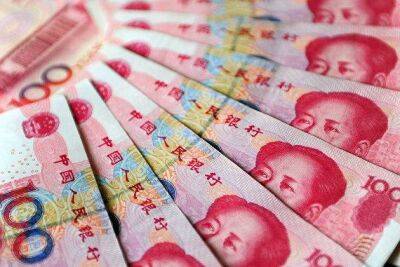 Китайский юань продолжает снижаться, несмотря на усилия центрального банка, во вторник