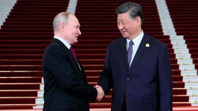 Путин увиделся с Си перед конференцией "Пояс и путь" в Пекине