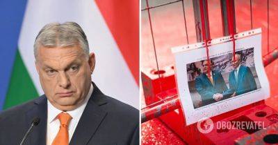 Встреча Орбана и Путина – в Венгрии оппозиционные депутаты облили красной краской забор возле офиса Орбана – фото и видео