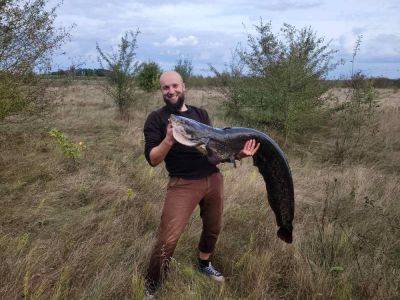 Рыбалка поймал в Украине сома весом 24 кг - фото - apostrophe.ua - Украина