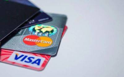АМКУ разрешил Mastercard и Visa уменьшить межбанковскую комиссию