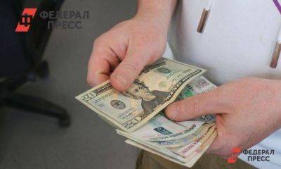 Курс доллара поднялся до 101,5 рубля