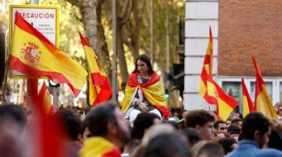 В Испании десятки тысяч людей протестуют против соглашения премьера с сепаратистами