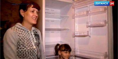 Равноценный обмен. Жене оккупанта вместо убитого мужа привезли холодильник — видео