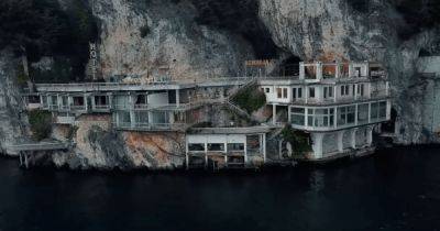 Любимое место знаменитостей: отель в скале на краю озера 20 лет борется со стихией (фото)