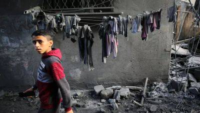 Фотографии недели: лица войны Израиля с ХАМАС, разрушения и скорбь