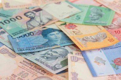 Азиатские валюты падают на фоне стабильного доллара