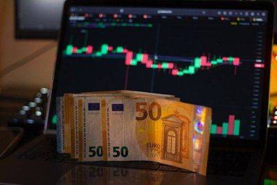 Евро достиг максимума за две недели на охлаждении ожиданий по поводу ставок