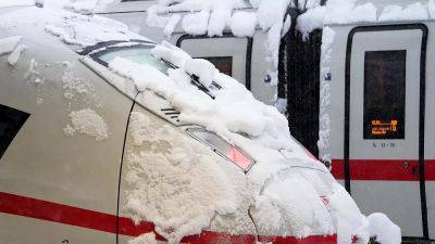 Железные дороги Германии и аэропорт Мюнхена не справились со снегопадом