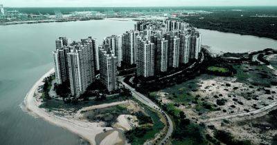 Си Цзиньпин - Роскошный курорт стоимостью $100 млрд превратился в "город-призрак" с пустыми небоскребами - focus.ua - Китай - Украина - Монако - Малайзия