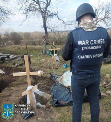 На Харьковщине эксгумировали тело пенсионера, погибшего от обстрела РФ