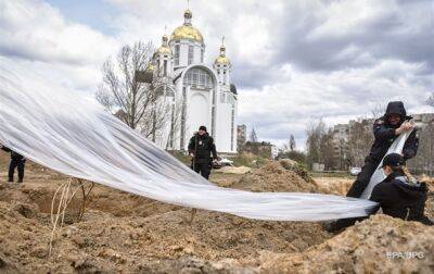 На Киевщине выявили 15 захоронений и три пыточных