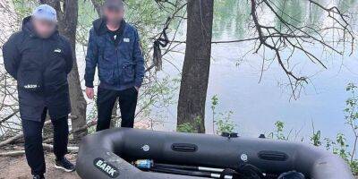 Не доплыли. Пограничники задержали двух мужчин, которые на лодке пытались попасть в Венгрию — фото - nv.ua - Россия - Украина - Венгрия