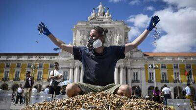 650 тысяч окурков в центре Лиссабона в защиту климата