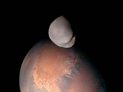Космический онд из ОАЭ получил уникальное фото спутника Марса