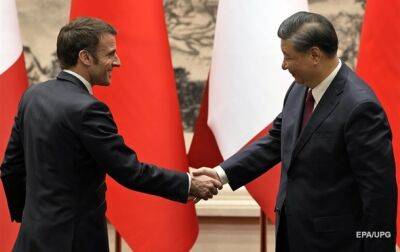 Си Цзиньпин "необычайно щедро" принял Макрона - Reuters