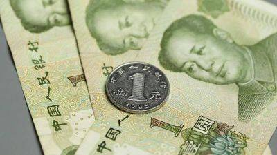 Греф заявил об ожидании роста использования юаня во внешних операциях России