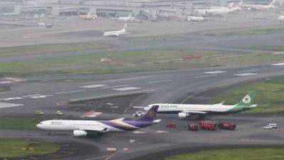 Два самолета столкнулись в аэропорту Токио, обошлось без пострадавших