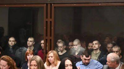 В России начался суд над 24 бывшими участниками украинского полка "Азов"