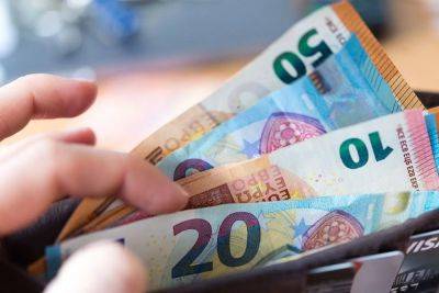 Немецкие работники получат премию в 3000 евро