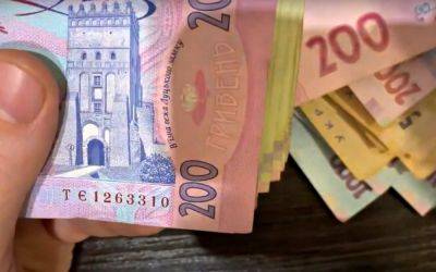 Украинцам выплачивают почти 12 тысяч грн помощи: в Кабмине рассказали, кто уже может оформить