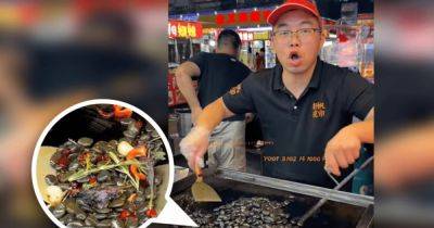 Обсосать и выплюнуть: в Китае люди "едят" речные камни со специями (видео)