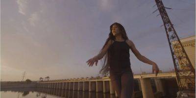 Танцевала на крыше здания. Руслана опубликовала архивное видео с Каховской ГЭС, снятое до полномасштабной войны