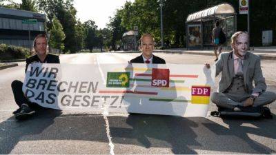 Роберт Хабек - Олафа Шольц - Экоактивисты в масках Шольца заблокировали движение в Германии - obzor.lt - Германия - Берлин - Протесты