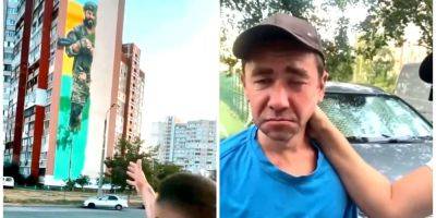 Это Троещина! Киевляне показательно проучили вора, укравшего трос для создания мурала с украинским Героем — видео