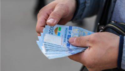 В Кыргызстане депутаты намерены запретить указывать цены в долларах и печатать сомы вне страны