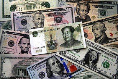 Рубль по итогам торгов повысился к доллару и снизился к юаню